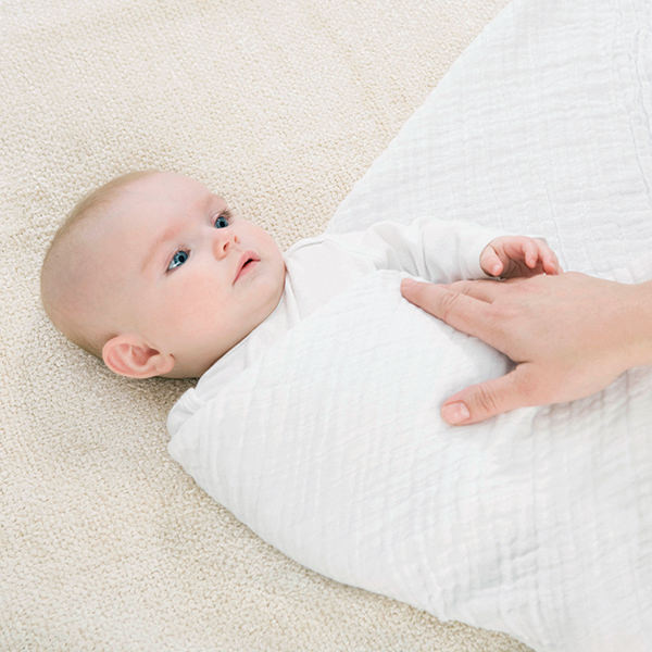 قنداق نوزادان-آموزش قنداق نوزاد-روش قنداق کردن-قنداق کردن تا چند ماهگی-انواع قنداق