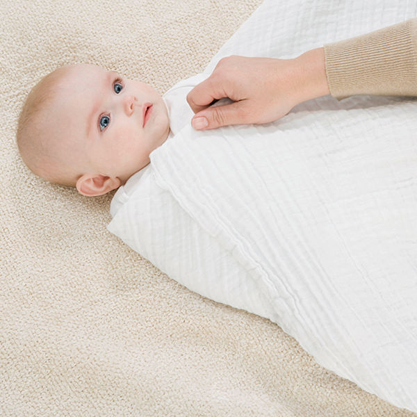قنداق نوزادان-آموزش قنداق نوزاد-روش قنداق کردن-قنداق کردن تا چند ماهگی-انواع قنداق
